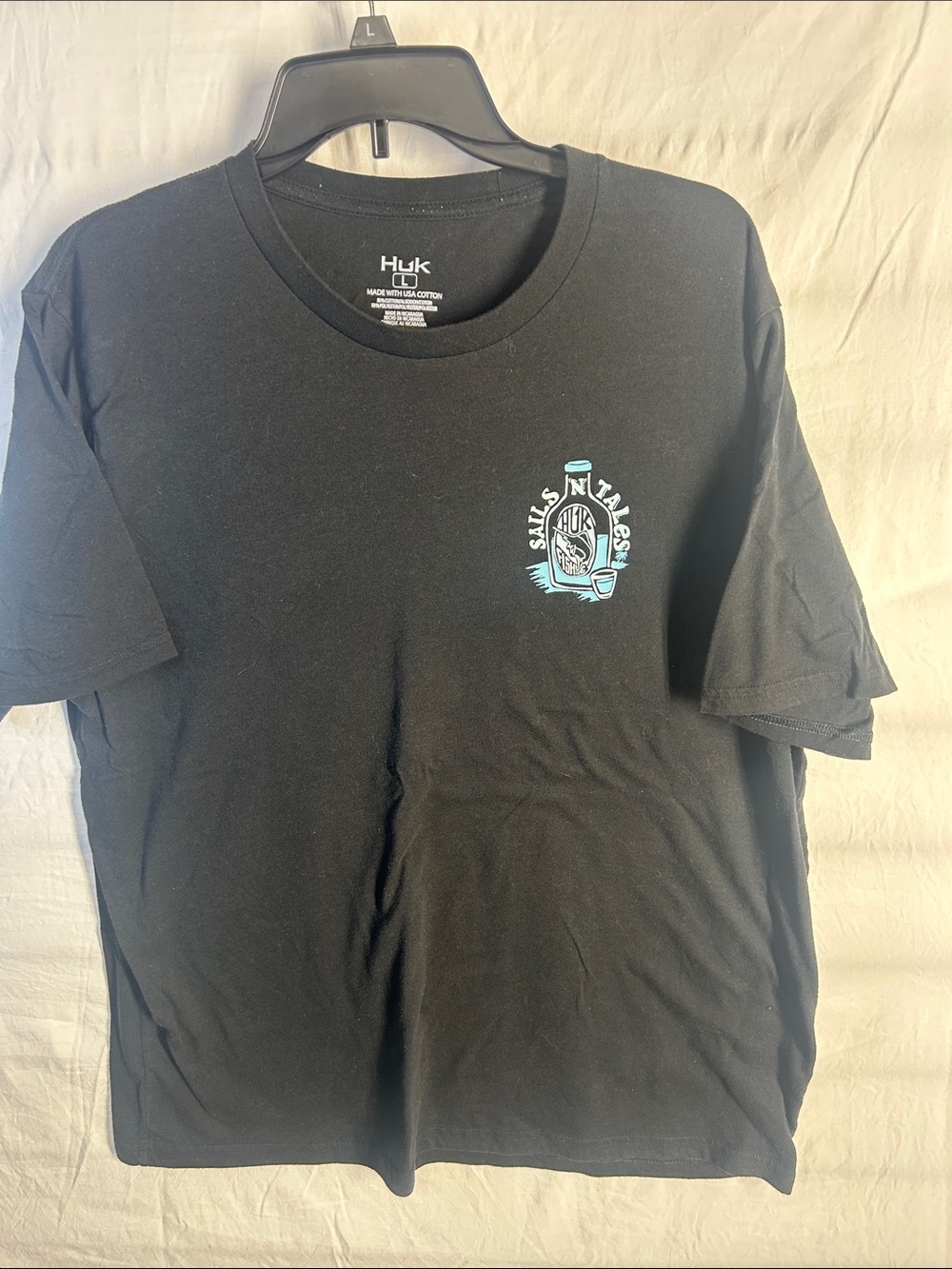 Huk Black Short-Sleeve Tee with Teal Chest Logo